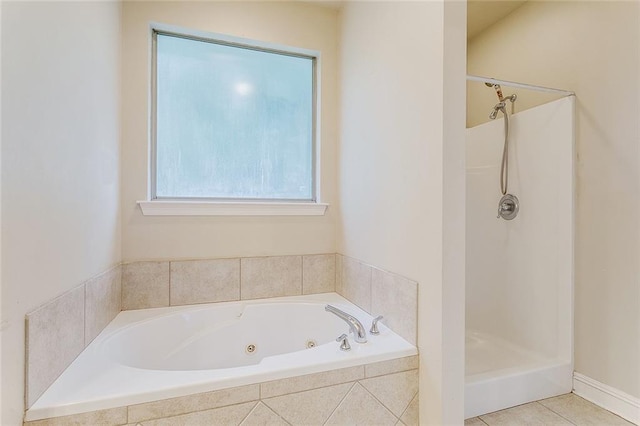 739 Chevreuil St, Mandeville, LA 70448 - bathroom with a jetted tub, walk in shower, and tile patterned floors