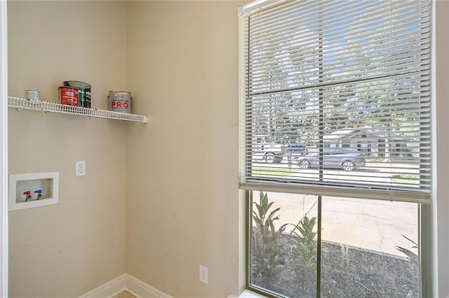 739 Chevreuil St, Mandeville, LA 70448 - washroom with baseboards and washer hookup