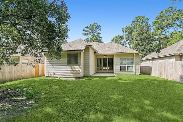739 Chevreuil St, Mandeville, LA 70448 - back of house with a ceiling fan, a fenced backyard, a patio area, and a shingled roof