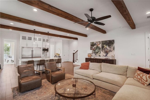 6818 Louisville St, New Orleans, LA 70124 - living area with stairway, beamed ceiling, ceiling fan, wood finished floors, and recessed lighting