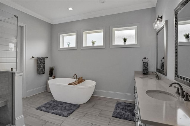 6818 Louisville St, New Orleans, LA 70124 - full bath with double vanity, a freestanding bath, a stall shower, crown molding, and recessed lighting