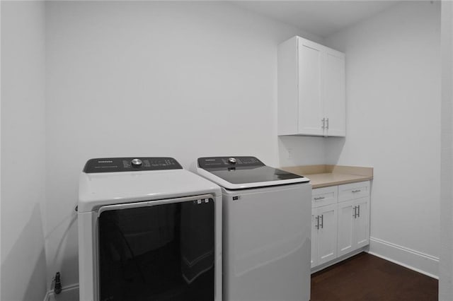 6818 Louisville St, New Orleans, LA 70124 - laundry area with separate washer and dryer, cabinet space, and dark wood finished floors