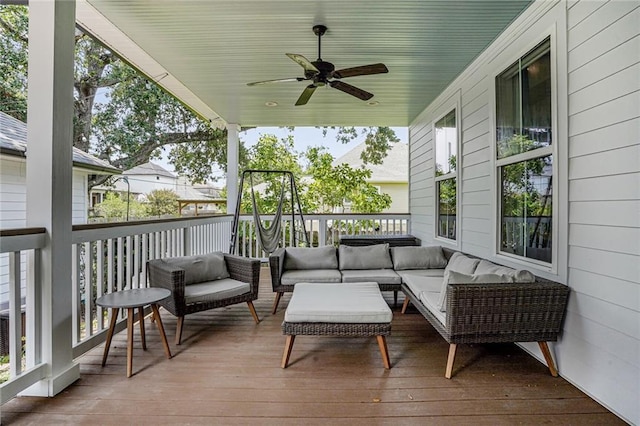 6818 Louisville St, New Orleans, LA 70124 - wooden terrace with an outdoor living space and a ceiling fan
