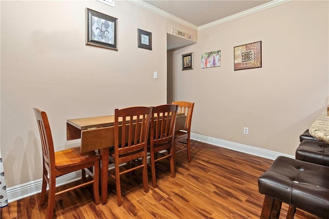 3805 Houma Blvd Unit C210, Metairie, LA 70006 - dining space featuring wood finished floors and crown molding