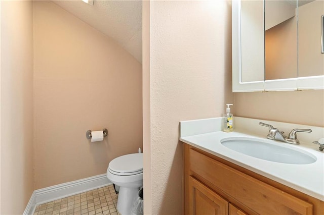3805 Houma Blvd Unit C210, Metairie, LA 70006 - bathroom with vanity and lofted ceiling