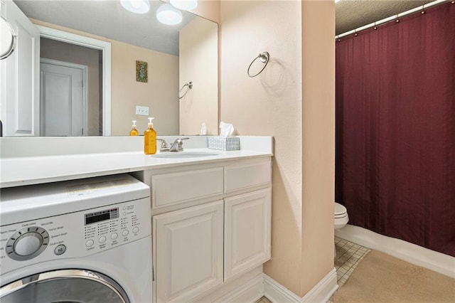 3805 Houma Blvd Unit C210, Metairie, LA 70006 - bathroom with washer / dryer, vanity, a shower with shower curtain, and tile patterned flooring
