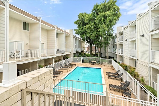 3805 Houma Blvd Unit C210, Metairie, LA 70006 - community pool featuring a residential view and a patio