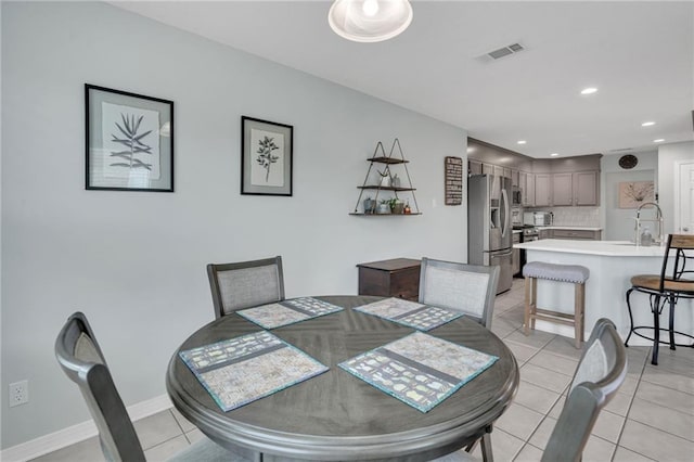 497 Jj Ln, Covington, LA 70433 - dining room with light tile patterned floors and recessed lighting