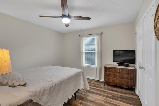 497 Jj Ln, Covington, LA 70433 - bedroom featuring wood finished floors, ceiling fan, and a closet