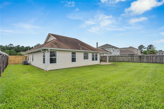 497 Jj Ln, Covington, LA 70433 - rear view of house with a fenced backyard
