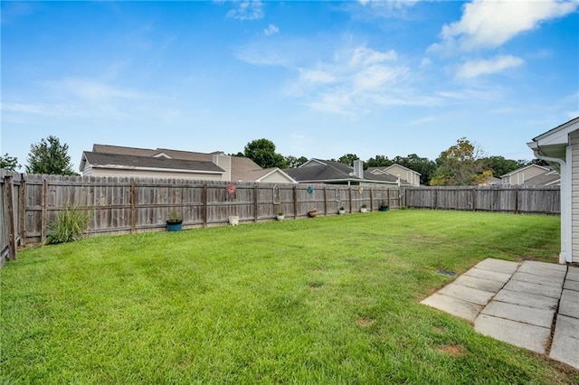 497 Jj Ln, Covington, LA 70433 - fenced backyard with a patio