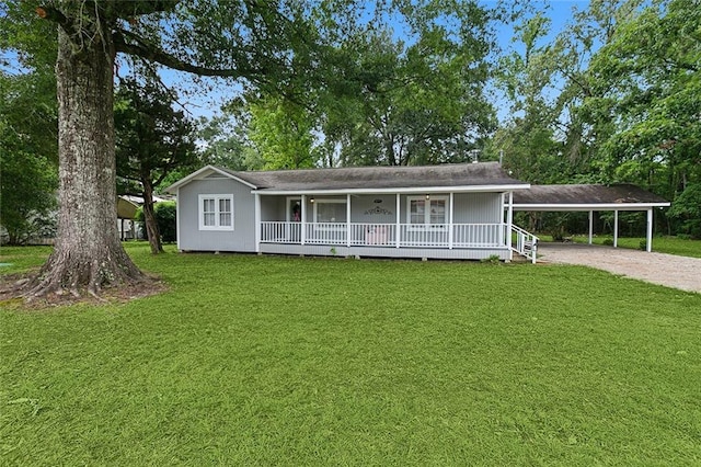 18155 La Highway 16, Denham Springs, LA 70726 - view of front of home featuring a front yard, a porch, driveway, and a carport