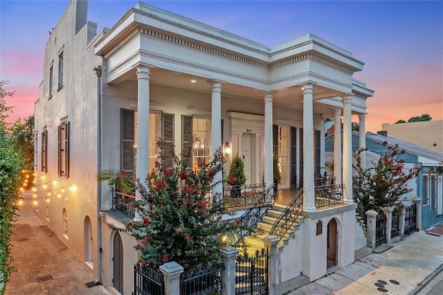521 Dauphine St, New Orleans, LA 70112 - view of property at dusk