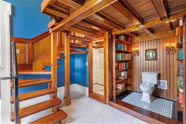 521 Dauphine St, New Orleans, LA 70112 - bathroom featuring a wooden ceiling with exposed beams, wood walls, and tile patterned flooring
