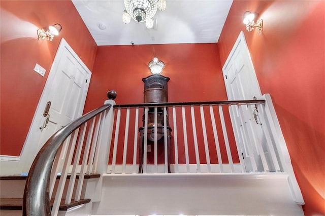 521 Dauphine St, New Orleans, LA 70112 - staircase featuring a chandelier