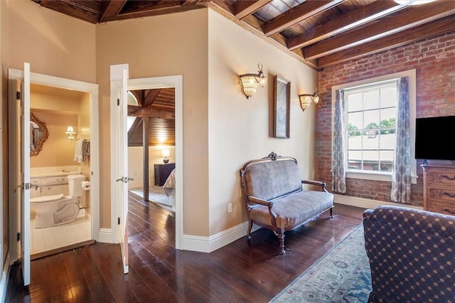 521 Dauphine St, New Orleans, LA 70112 - sitting room featuring a wooden ceiling with exposed beams, hardwood / wood-style flooring, and brick wall