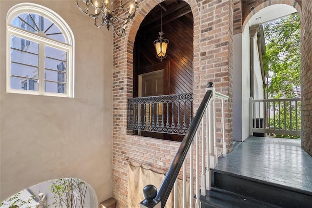 521 Dauphine St, New Orleans, LA 70112 - entrance to property with stucco siding and brick siding