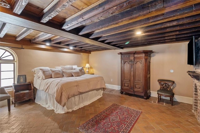 521 Dauphine St, New Orleans, LA 70112 - bedroom featuring baseboards and brick flooring