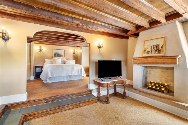 521 Dauphine St, New Orleans, LA 70112 - bedroom featuring a wood ceiling with exposed beams and baseboards