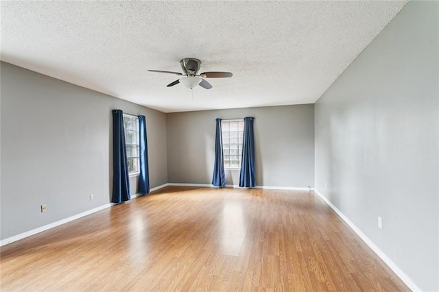 104 Magnolia Dr, Belle Chasse, LA 70037 - empty room with ceiling fan, a textured ceiling, and wood finished floors