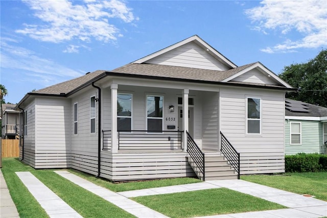 6032 Wingate Dr, New Orleans, LA 70122 - bungalow-style home with covered porch and a shingled roof