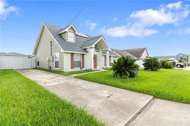 638 Colony Park Dr, La Place, LA 70068 - view of front of property with concrete driveway, roof with shingles, and brick siding