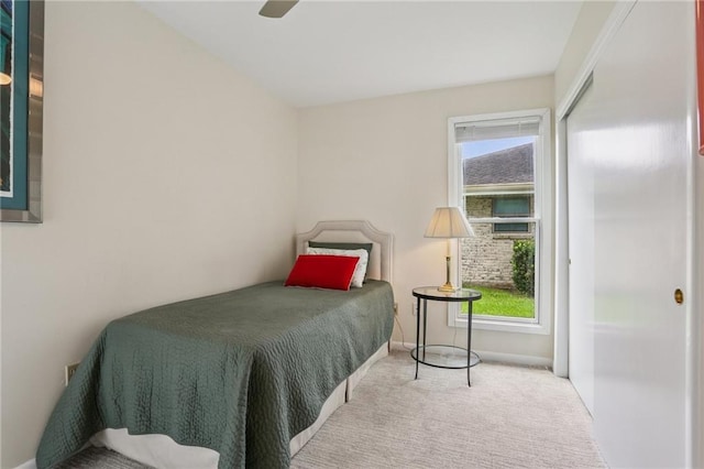 2310 Metairie Ct, Metairie, LA 70001 - carpeted bedroom with multiple windows and a ceiling fan