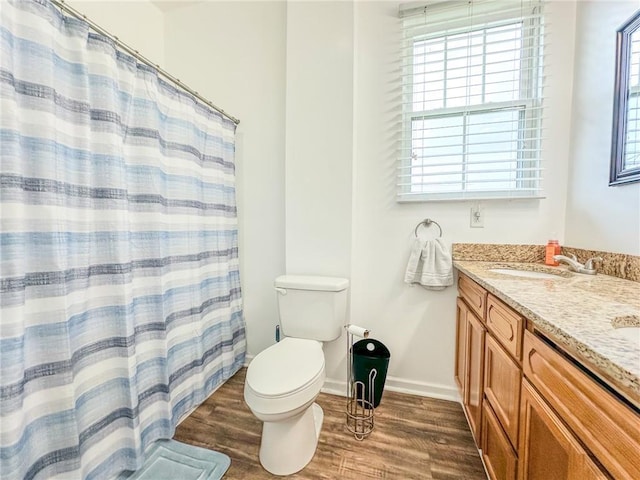 451 Sala Ave, Westwego, LA 70094 - bathroom with wood finished floors, double vanity, and a shower with shower curtain