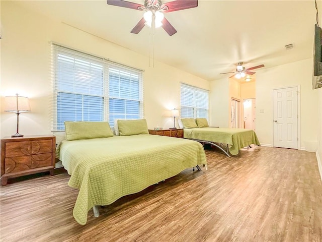451 Sala Ave, Westwego, LA 70094 - bedroom featuring wood finished floors and a ceiling fan