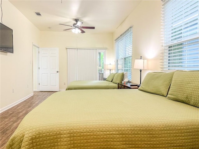451 Sala Ave, Westwego, LA 70094 - bedroom with wood finished floors and a ceiling fan