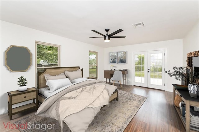 106 Woodlawn Ln, Mandeville, LA 70471 - bedroom with french doors, access to exterior, wood finished floors, a desk, and a ceiling fan