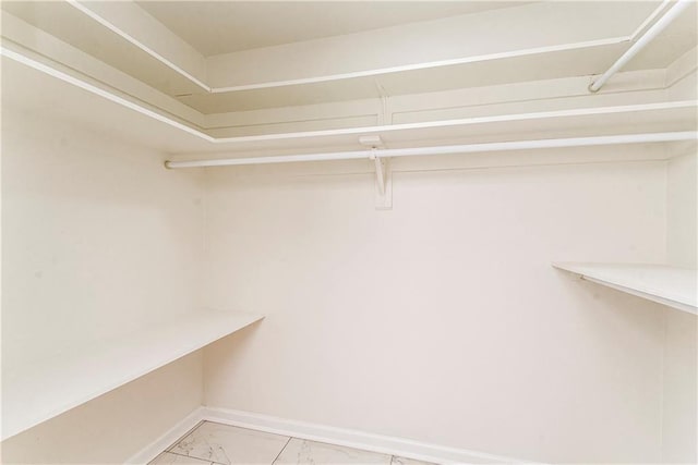 106 Woodlawn Ln, Mandeville, LA 70471 - spacious closet with light marble finish flooring