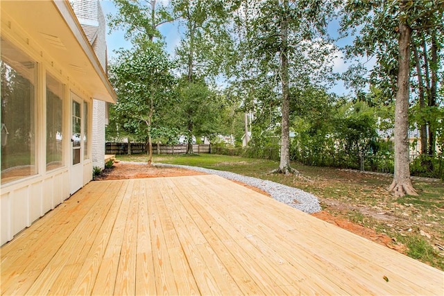 106 Woodlawn Ln, Mandeville, LA 70471 - wooden terrace with a fenced backyard and view of scattered trees
