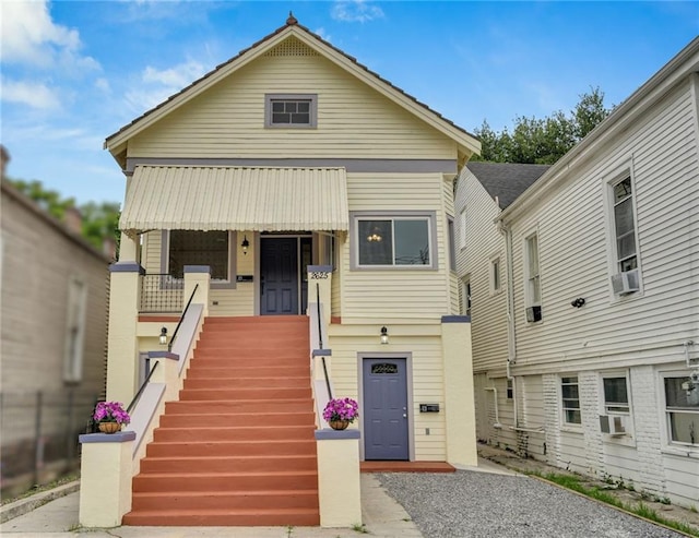 2625 Ursulines Ave, New Orleans, LA 70119 - view of front of home with covered porch and stairway