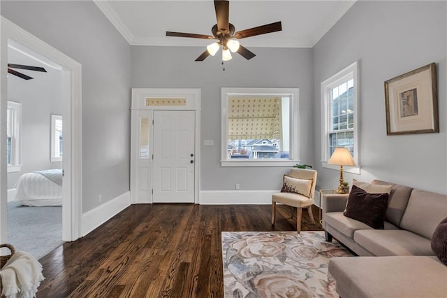 2625 Ursulines Ave, New Orleans, LA 70119 - living room featuring a ceiling fan, dark wood-style floors, and ornamental molding