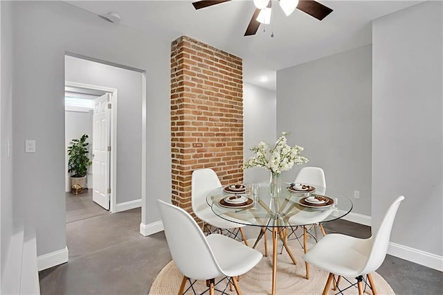 2625 Ursulines Ave, New Orleans, LA 70119 - dining room with finished concrete floors, a ceiling fan, and recessed lighting