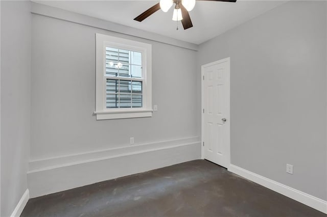 2625 Ursulines Ave, New Orleans, LA 70119 - spare room with concrete floors and a ceiling fan