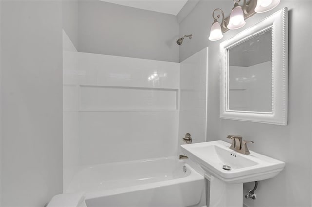2625 Ursulines Ave, New Orleans, LA 70119 - bathroom featuring bathing tub / shower combination and a sink