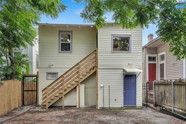 2625 Ursulines Ave, New Orleans, LA 70119 - back of house with stairway