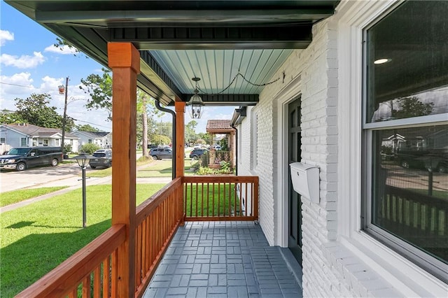 566 Gelpi Ave, Jefferson, LA 70121 - covered porch with a residential view