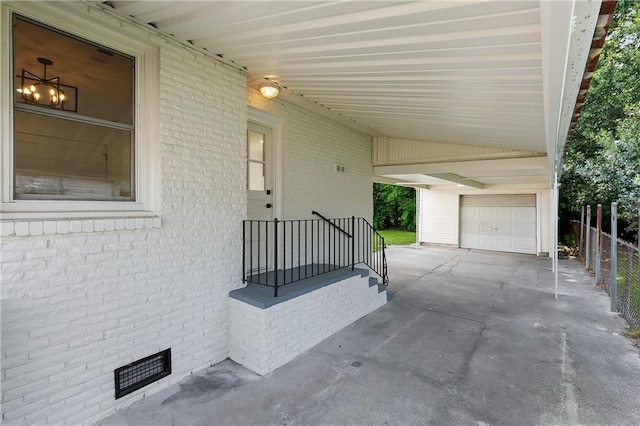 566 Gelpi Ave, Jefferson, LA 70121 - view of patio with a garage