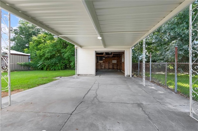 566 Gelpi Ave, Jefferson, LA 70121 - view of patio featuring an attached carport and an attached garage