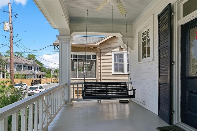 5540 Pitt St, New Orleans, LA 70115 - balcony with ceiling fan