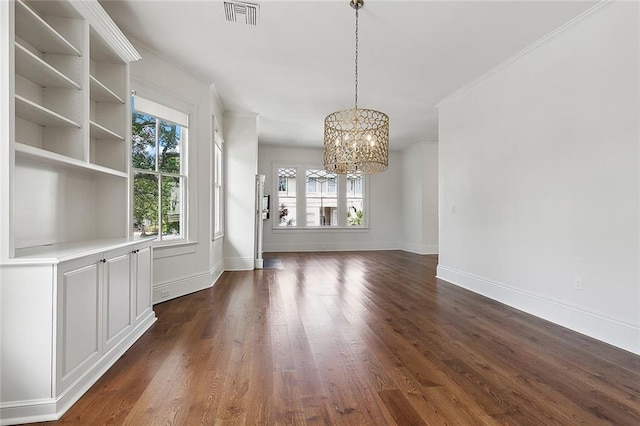 5540 Pitt St, New Orleans, LA 70115 - unfurnished dining area featuring a chandelier, dark wood finished floors, and ornamental molding