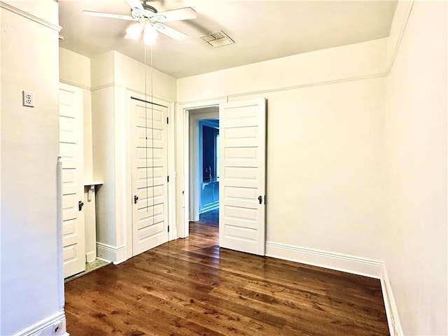 5540 Pitt St, New Orleans, LA 70115 - unfurnished bedroom featuring wood finished floors and ceiling fan