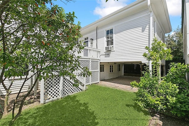 5540 Pitt St, New Orleans, LA 70115 - rear view of house with a carport and a yard