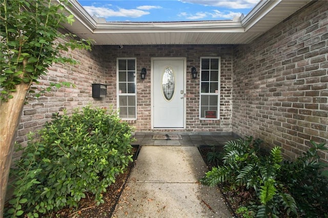 345 Sugarpine Dr, Gretna, LA 70056 - view of exterior entry featuring brick siding