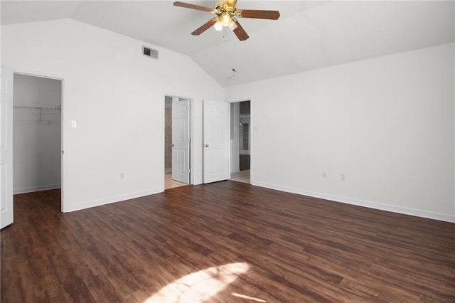 345 Sugarpine Dr, Gretna, LA 70056 - unfurnished bedroom with lofted ceiling, a walk in closet, wood finished floors, and ceiling fan