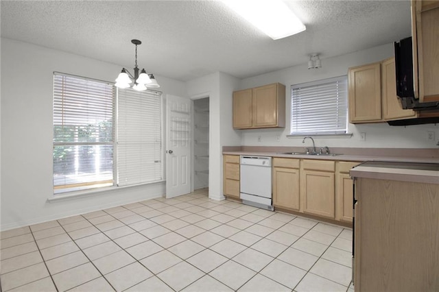 345 Sugarpine Dr, Gretna, LA 70056 - kitchen featuring white dishwasher, light brown cabinets, a textured ceiling, and healthy amount of natural light