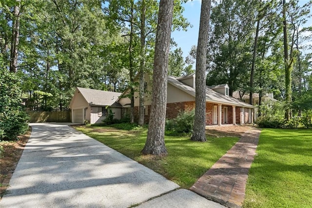201 Shaunell Dr, Mandeville, LA 70448 - view of front of property featuring driveway and brick siding